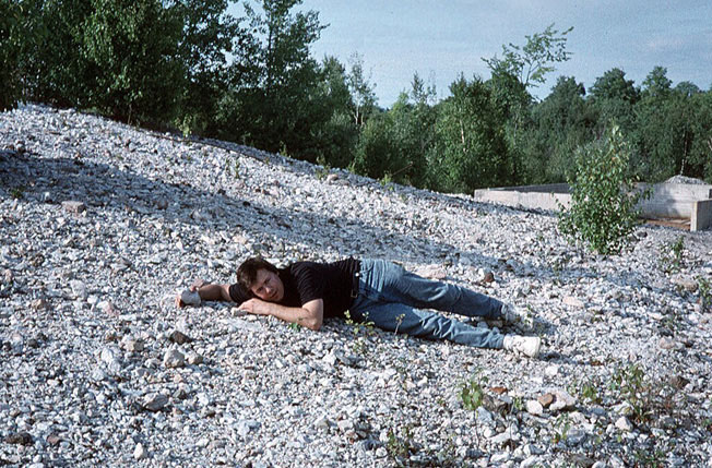 Here is Corby Waste lying on the ground at the Long Lake Zinc mine. We spent many hours collecting at the mine. With a lot of prior geologic research, I found this mine and was the first American to collect fluorescent minerals there in 1993.