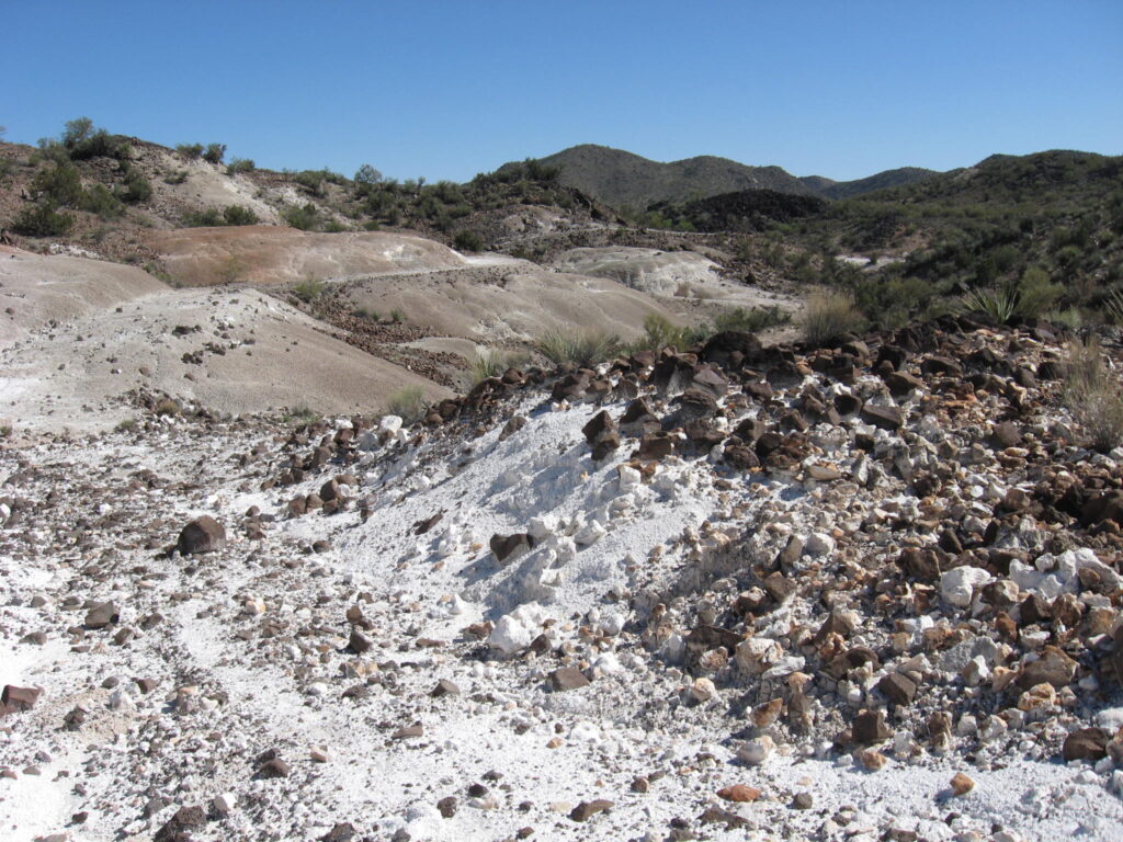 Magnesite deposits in the hillsides.