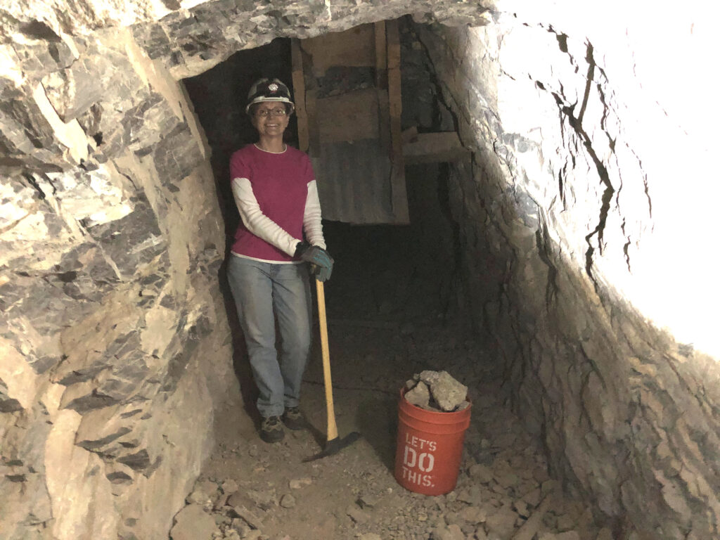 Debbie Polman collecting specimens from the chute.