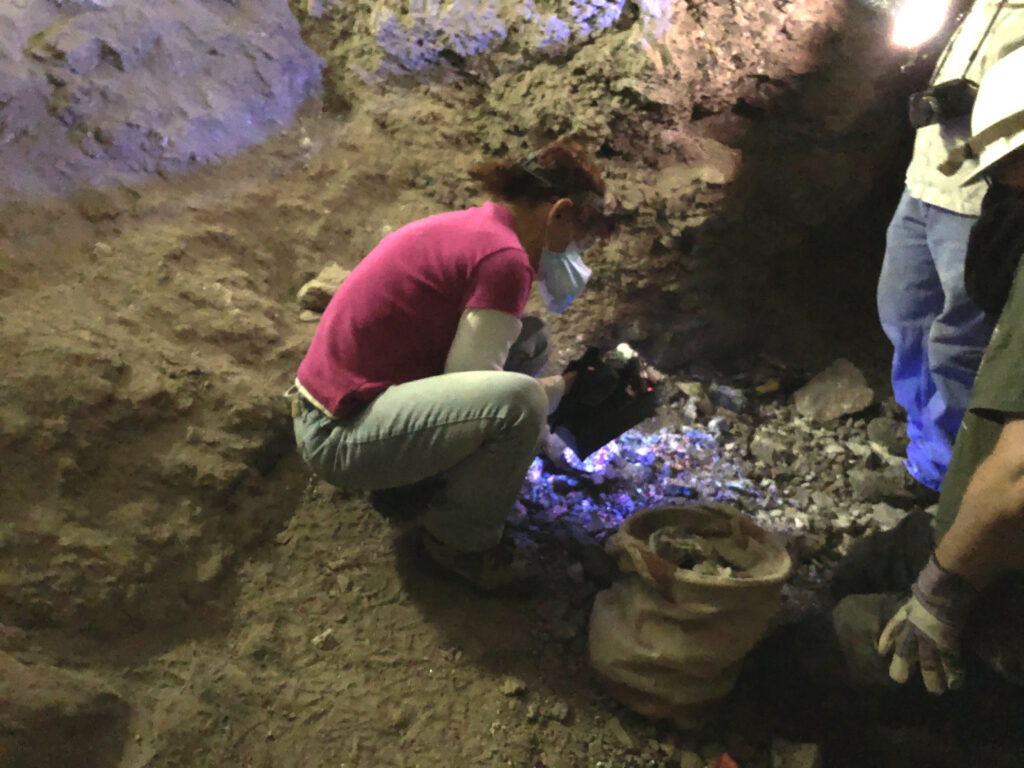 Here is Debbie reviewing some of her finds with a UV lamp.